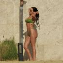 Anastasia Karanikolaou – In a lime green bikini at the beach in Mexico