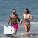 Alice Goodwin in White Bikini on the beach in Marbella