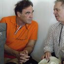 Director Oliver Stone with screenwriter Stanley Weiser on the set of W. Photo credit: Sidney Ray Baldwin