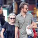 A smitten looking Dakota Fanning and her boyfriend Jamie Strachan go hand in hand for a stroll around New York City - 443 x 594
