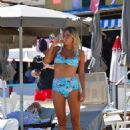 Sophie Monk in Blue Bikini on a beach in Portofino