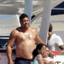 Retired football legend Ronaldo, 42, appears in great spirits as he takes a massive leap into the sea on fun-filled family trip in Spain - 454 x 681