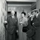 Otto Frank shows Anne Frank's room to the playwrights