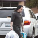 Glenn Danzig is spotted buying Fresh Step Cat Litter, along with Jennie-O Italian Turkey Sausage from his local market - 396 x 594