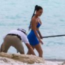 Kim Kardashian – Seen in a blue top bikini at the paddle boarding session in Turks - 454 x 303