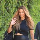 Tyra Banks – In black leggings arrives at the Day of Indulgence party in Brentwood - 454 x 681