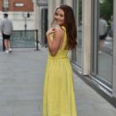 Jess Impiazzi – Out for a stroll in a yellow dress - 454 x 637