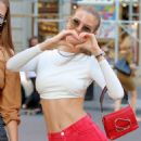 Kate Demianova – Posing in a white crop top and red mini skirt in New York City - 454 x 681