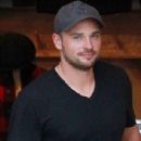 What would Clark Kent say? Tom Welling looks worlds away from his clean cut Smallville alter-ego - 306 x 423