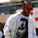 Lewis Hamilton pays tribute to Martin Luther King by sporting a T-shirt with his face on it as he steps out ahead of the Bahrain Grand Prix
