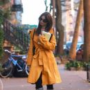 Emily Ratajkowski – In a yellow coat and zebra-striped boots in New York