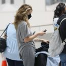 Shailene Woodley &#8211; Wearing a ring on her left ring finger while arrive in Los Angeles