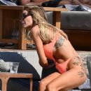 Laura Anderson – Seen in a coral swimsuit in Mykonos - 454 x 618
