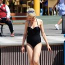 Chloe Jasmine in Black Swimsuit on the beach in Cape Verde - 454 x 701