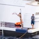 Kendall Jenner – pictured in a bikini while on a yacht in Salerno