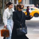 Jennifer Lopez – Wearing Gucci sunglasses and carrying a Hermes Birkin bag