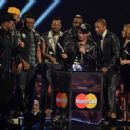 Kylie Minogue, Bruno Mars and Pharrell Williams - The BRIT Awards 2014 - Show - 454 x 323
