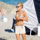 Charlotte Mckinney – In a zebra print bikini with her boyfriend in Miami