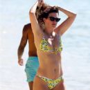 Rhea Durham – In a lemon print bikini on the beach in Barbados
