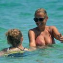 Sonia Bruganelli in Bikini on the beach in Formentera