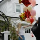 Dakota Fanning – Receives loads of balloons for her 29th birthday in Los Angeles