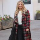 Sian Welby – In a tartan dress and tight fit black denim and boots in London - 454 x 681