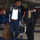 Madonna  wore a wide-brimmed hat at JFK Airport in New York