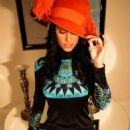 Bria Valente in Orange hat - 454 x 714