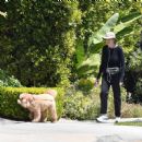 Marcia Cross – walking her dog in Los Angeles - 454 x 449