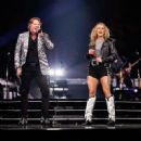 Last night (March 13, 2023), Axl joined Carrie Underwood on stage for his show at Crypto.com Arena in Los Angeles, CA - 454 x 450