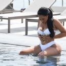 Natalie Nunn in White Bikini at a pool in Spain - 454 x 346