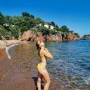 Alize Cornet in Bikini at the Beach