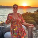 Kelly Brook drives fans wild with stunning Sardinia snaps as she says she 'rarely holidays'