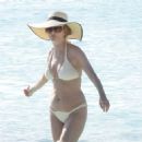 Heather Graham – Hits the beach in a white bikini in Tulum - 454 x 476
