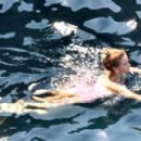 Emma Watson – In Pink bikini in Positano – Italy (hq)