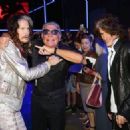 Steven Tyler, Roberto Cavalli and Joe Perry attend the Roberto Cavalli show during the Milan Menswear Fashion Week Spring Summer 2015 on June 24, 2014 in Milan, Italy. - 454 x 324