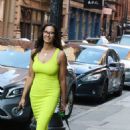 Padma Lakshmi- Seen in a neon green dress while out in Manhattan