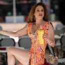 Jennifer Nicole Lee – Seen in an orange mini dress in Miami - 454 x 681