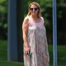 Katie Couric – Is seen with a puppy in The Hamptons – New York - 454 x 681