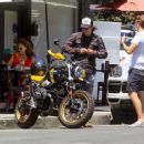 Taylor Kitsch – out on his motorbike - 454 x 364