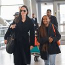 Angelina Jolie &#8211; With Zahara Jolie-Pitt arriving at JFK Airport in New York