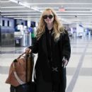Kathryn Newton – Catches a flight at LAX in Los Angeles - 454 x 681