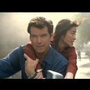 Front: Pierce Brosnan as James Bond; Back: Michelle Yeoh as Wai Lin.