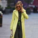 Ashley Roberts – In a lime green trench coat at Heart radio in London