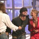 Tara Reid and Motley Crue - The 2004 Billboard Music Awards - Show - 454 x 323