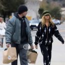 Denise Richards – Shopping in onesie with husband Aaron Phypers in Malibu