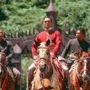 Chow Yun-Fat, flanked by royal bodyguards, in 20th Century Fox's Anna And The King - 12/99 - 350 x 235