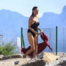 Ines Sastre in Black Swimsuit on the beach in Sotogrande - 454 x 303
