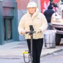 Deborra-Lee Furness – Riding an electric scooter through New York