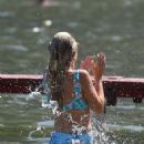 Sophie Monk in Blue Bikini on a beach in Portofino